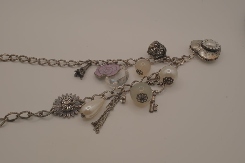 Vintage silver charm necklace with locket