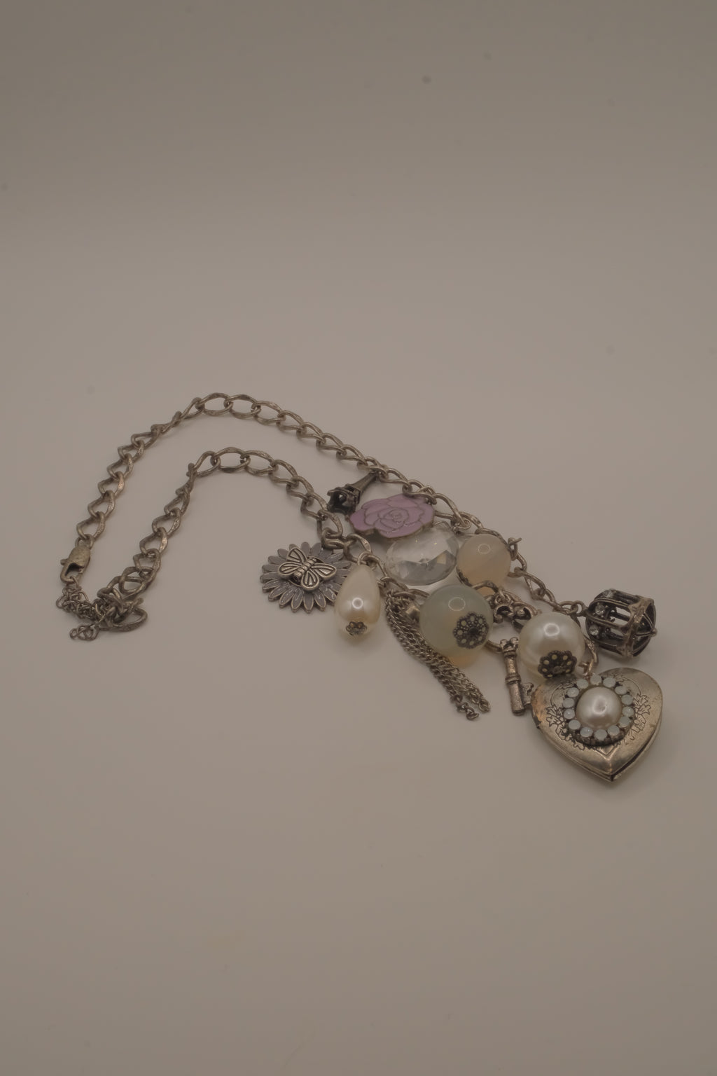 Vintage silver charm necklace with locket