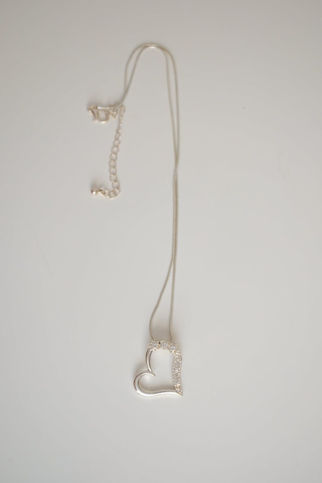 Sterling silver chain with open heart pendant