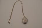 Antique oval Victorian style silver locket pendant