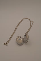 Antique oval Victorian style silver locket pendant