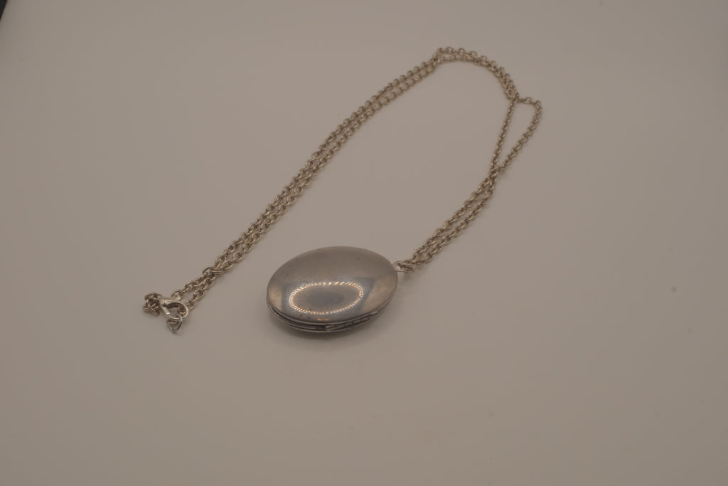 Antique oval Victorian style silver locket pendant