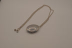 Antique oval Victorian style silver locket pendant