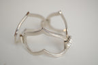 Silver tone open-heart link bracelet