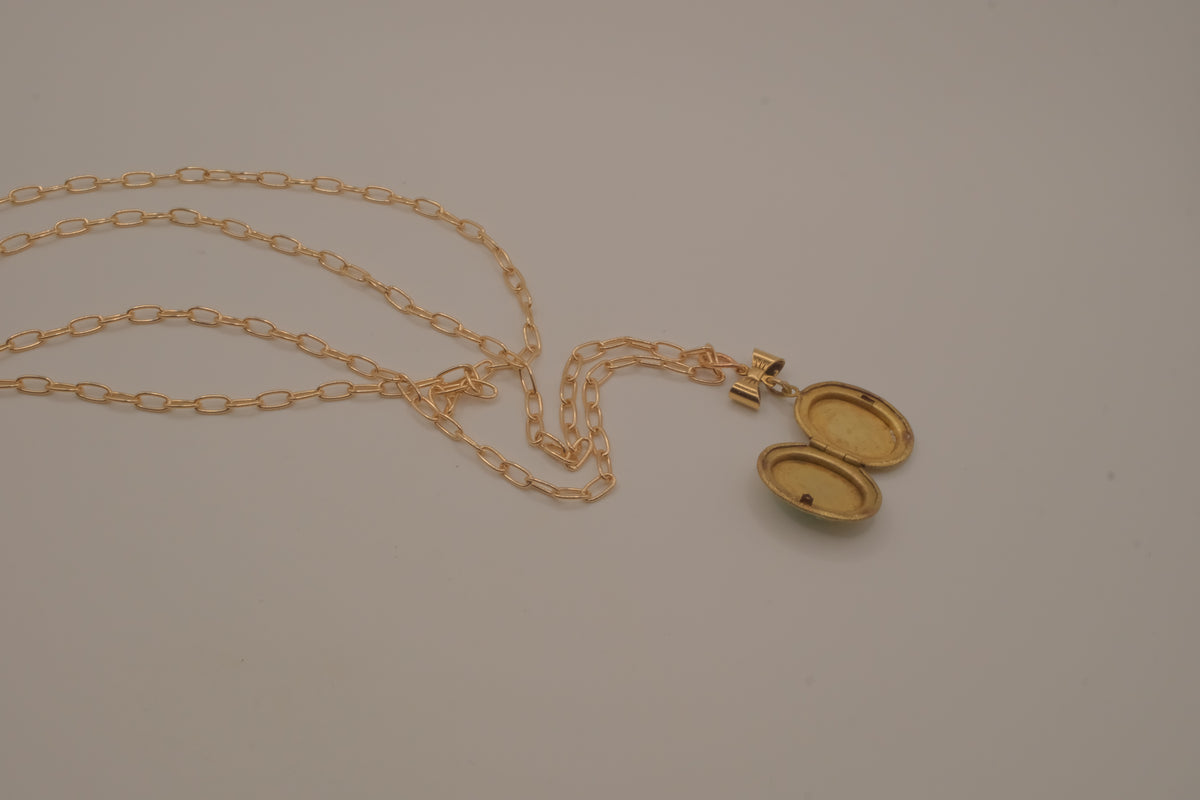 Vintage green cameo locket necklace