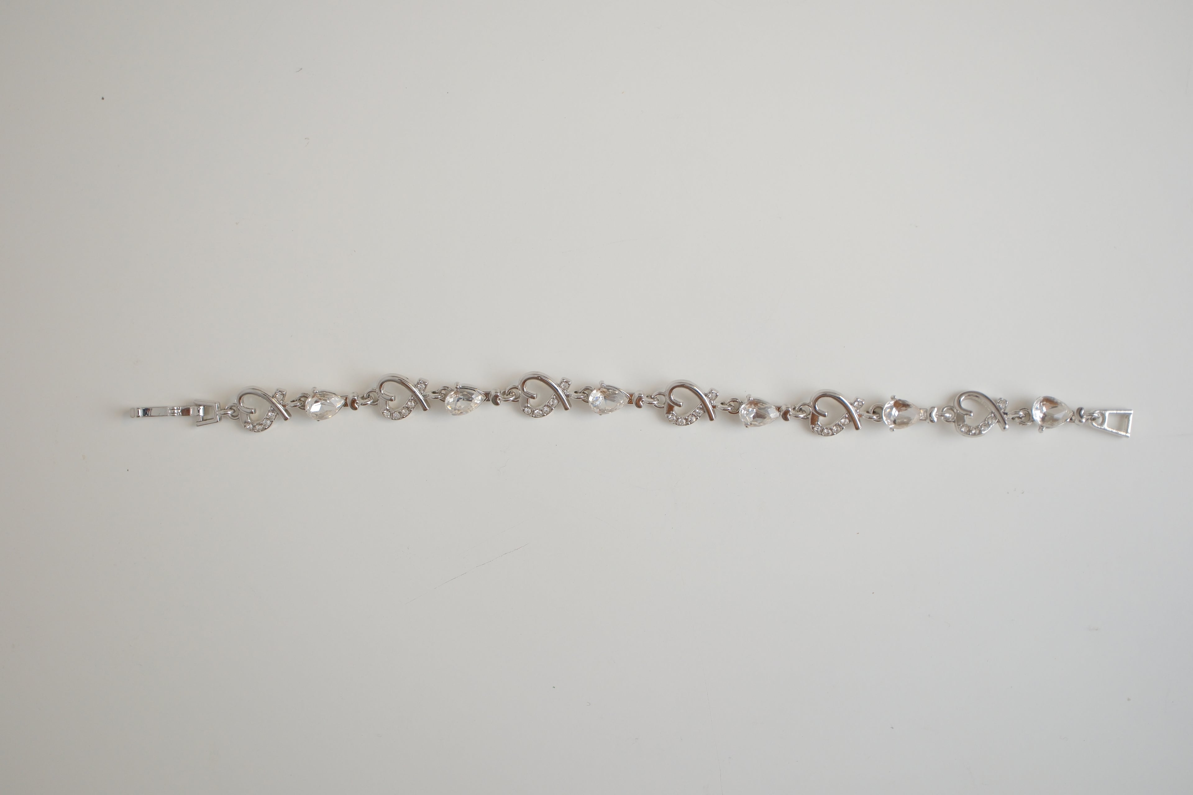 Silver-tone heart and crystal link bracelet