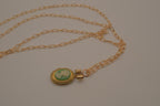 Vintage green cameo locket necklace