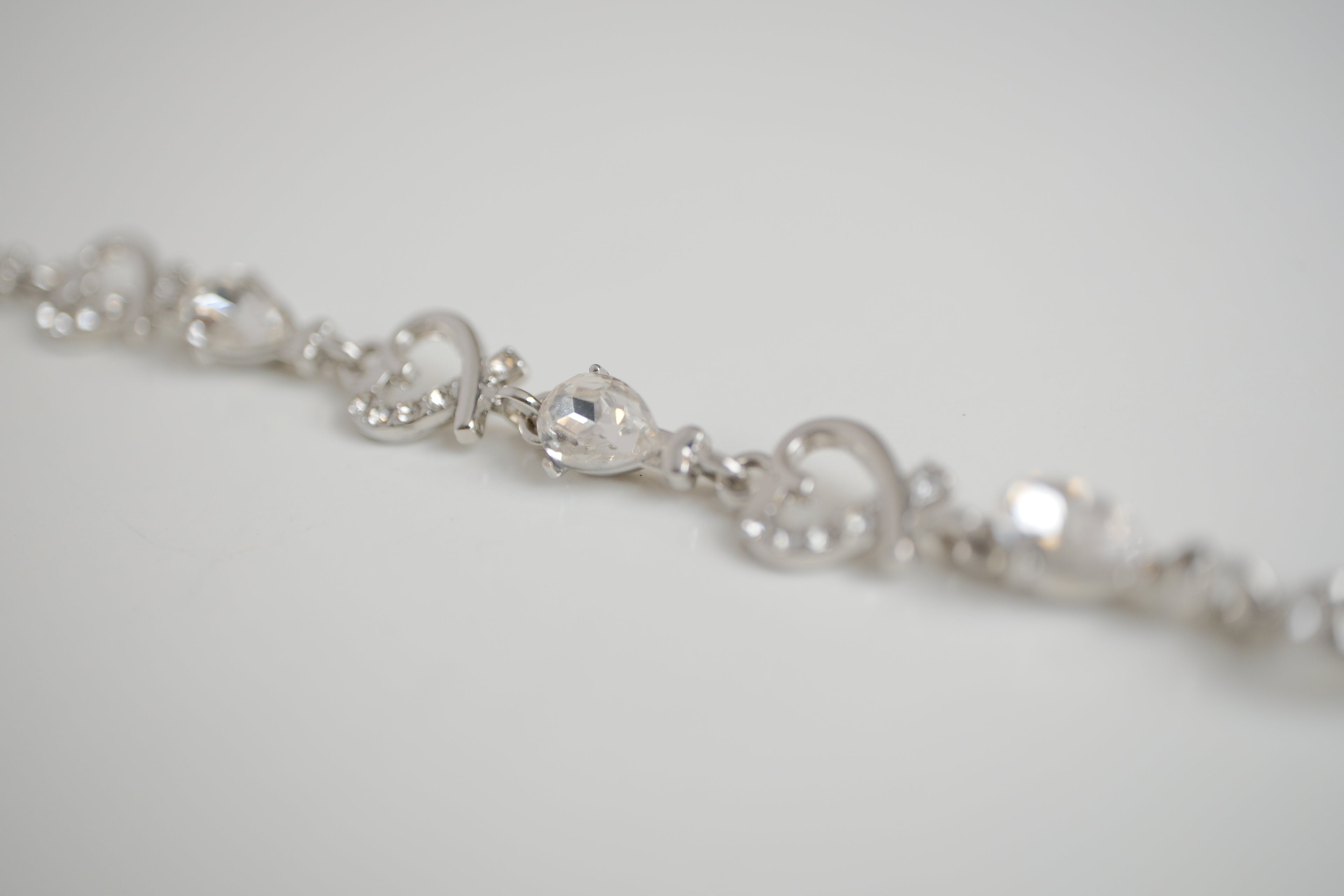Silver-tone heart and crystal link bracelet