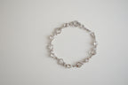 Silver-tone heart and crystal link bracelet