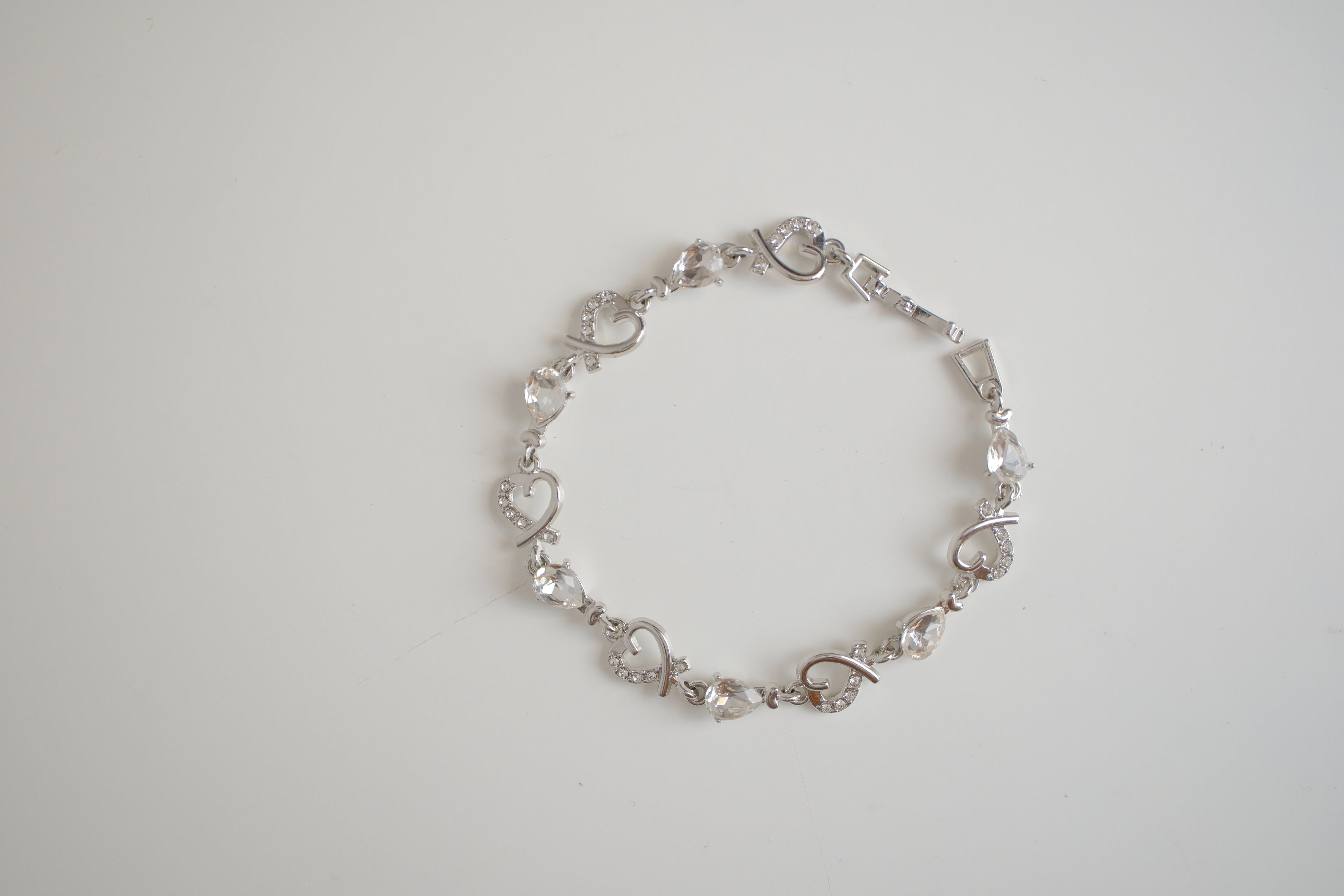 Silver-tone heart and crystal link bracelet