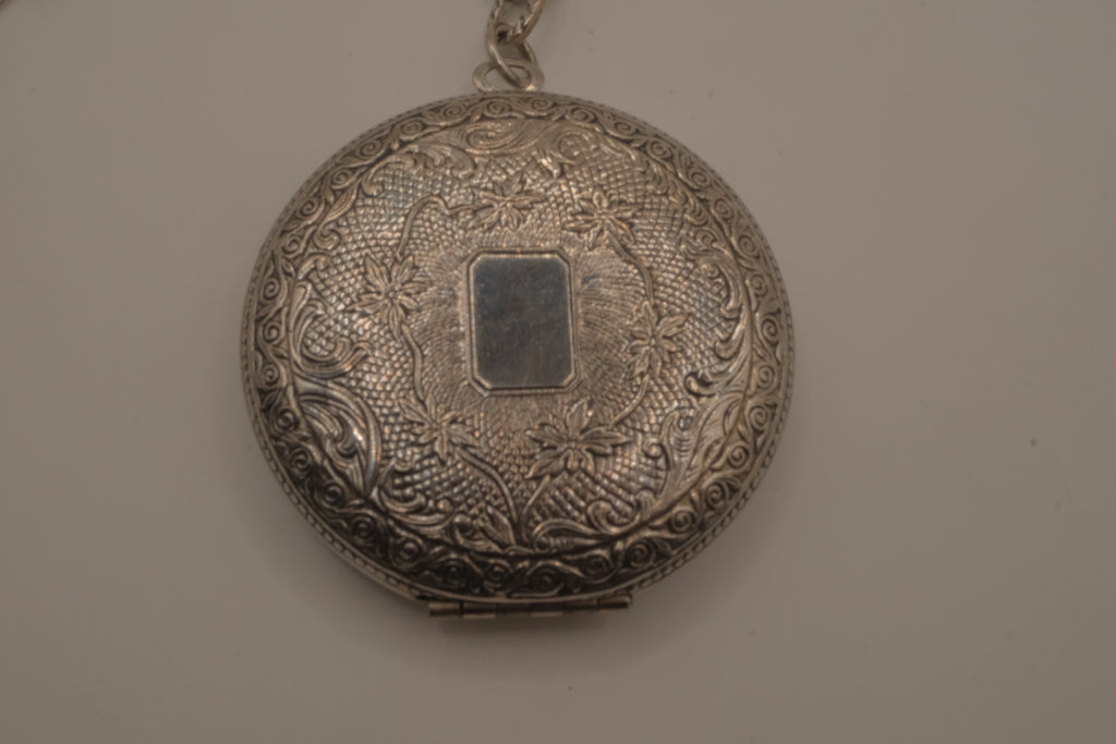 Antique chased floral motif locket necklace