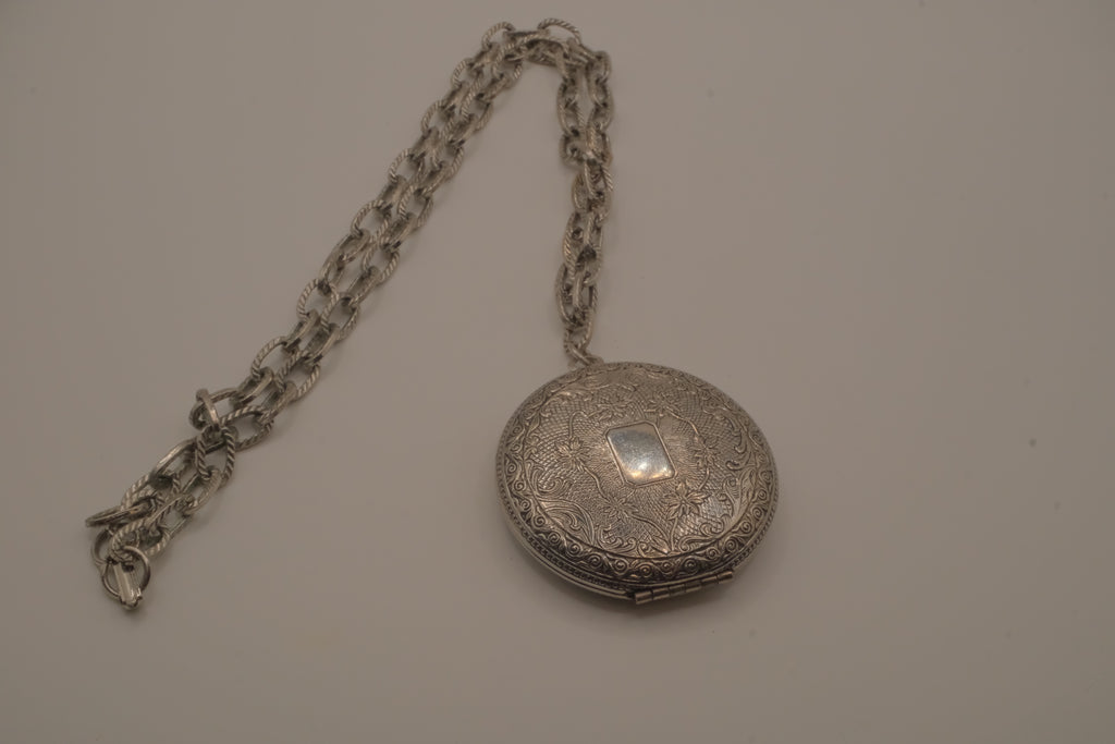Antique chased floral motif locket necklace
