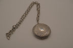 Antique chased floral motif locket necklace