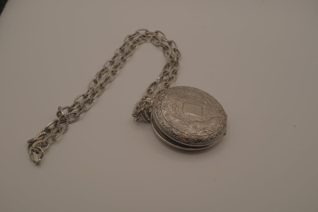 Antique chased floral motif locket necklace