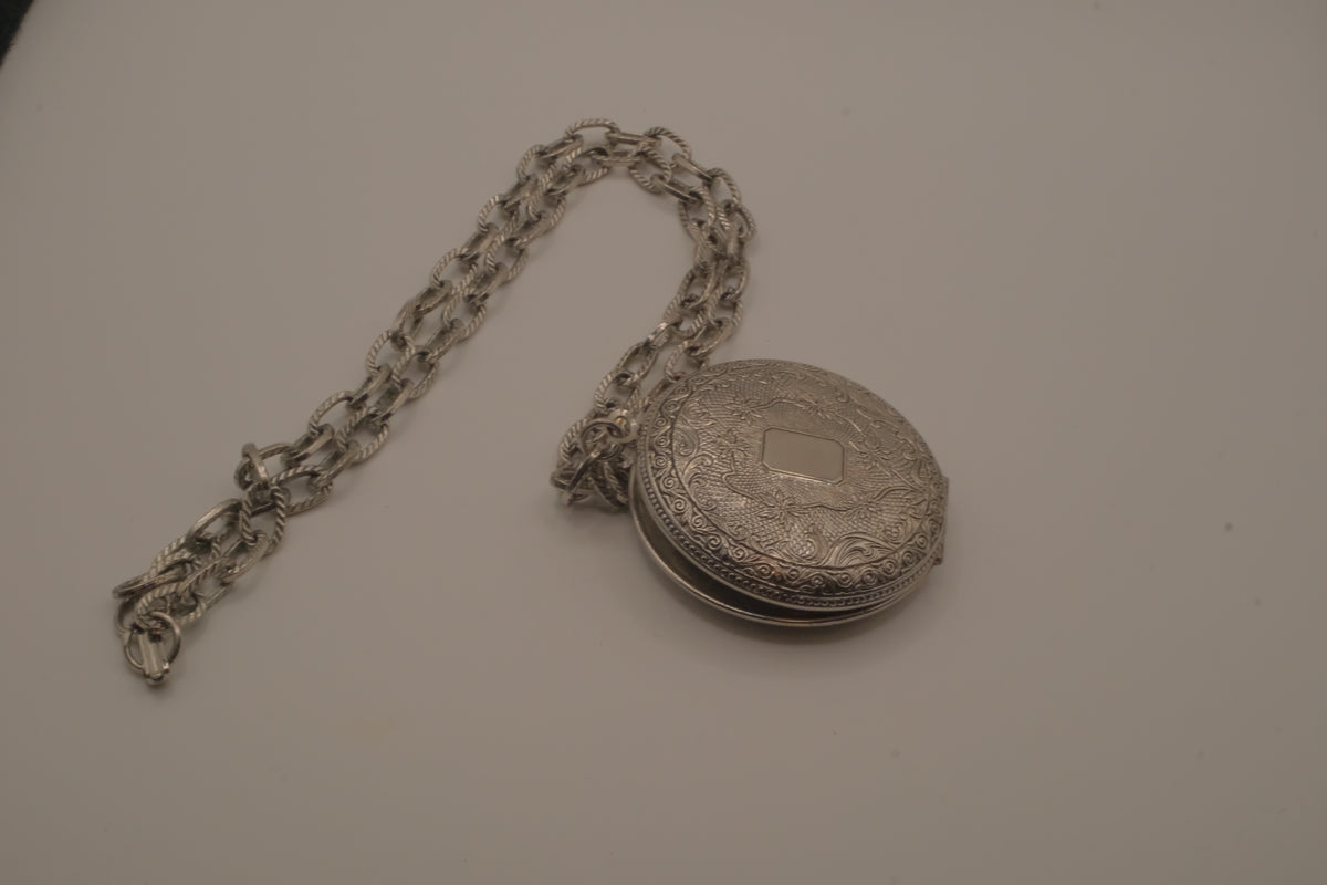 Antique chased floral motif locket necklace