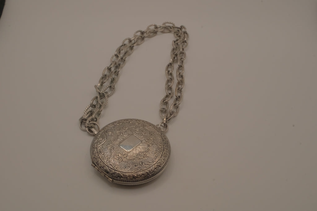 Antique chased floral motif locket necklace