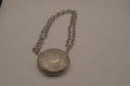 Antique chased floral motif locket necklace