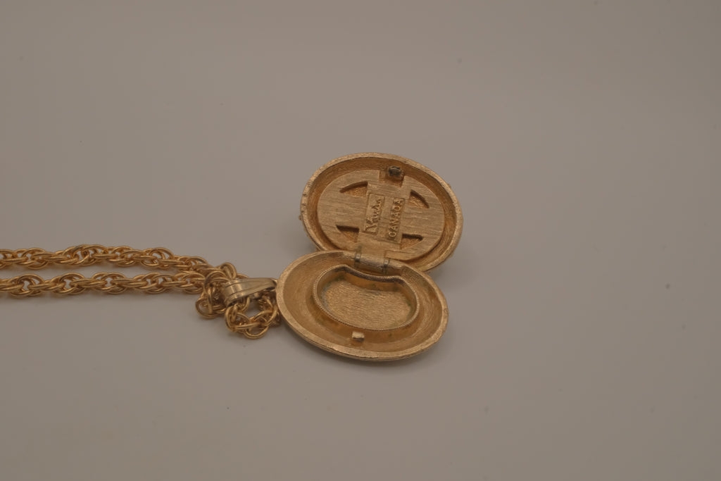 Vintage Vanda solid perfume locket necklace