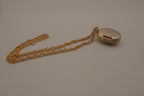 Vintage Vanda solid perfume locket necklace
