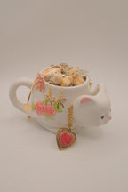 This mystery jewellery jar includes over 40 pieces of Coquette themed jewellery