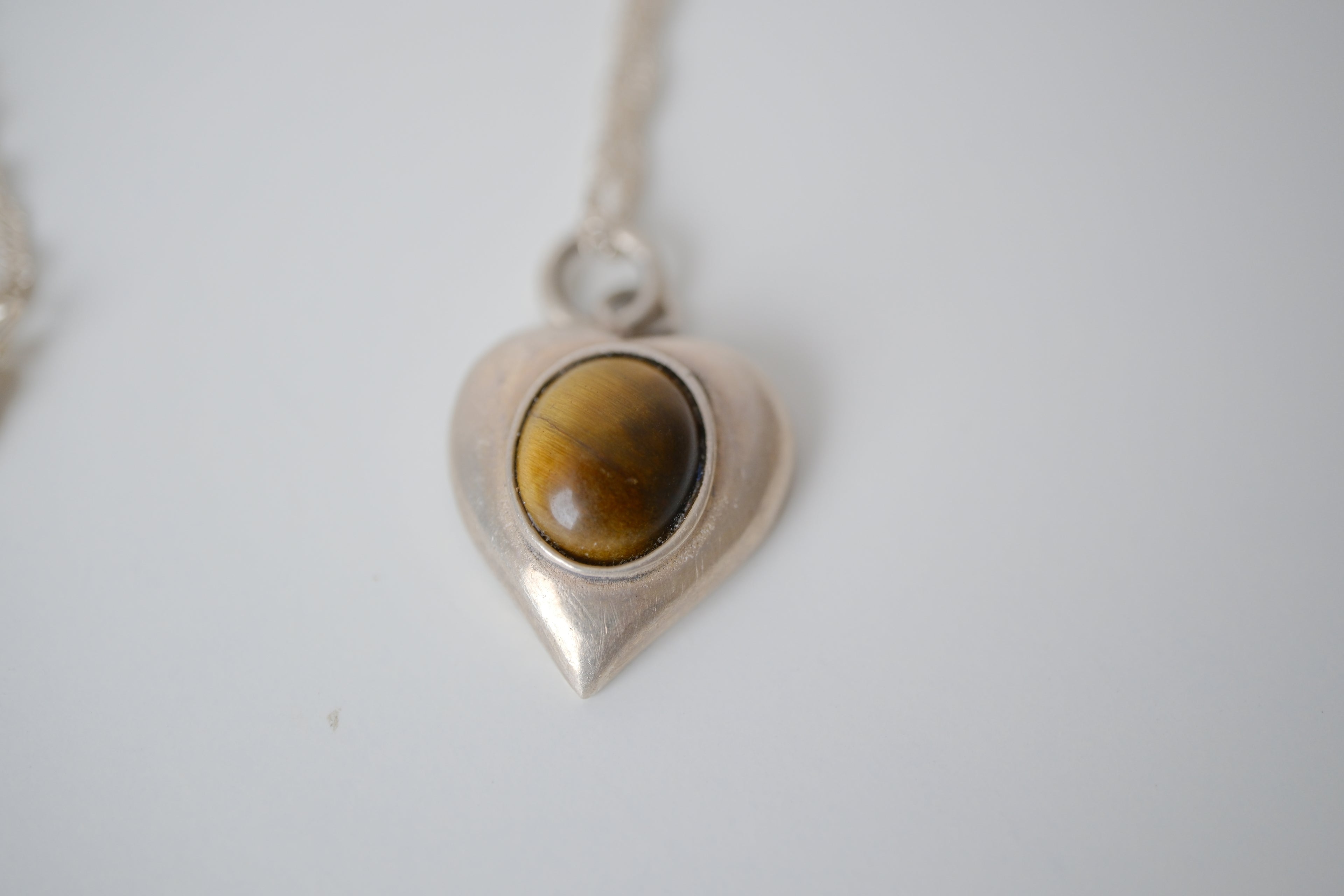 Sterling silver tiger's eye heart pendant