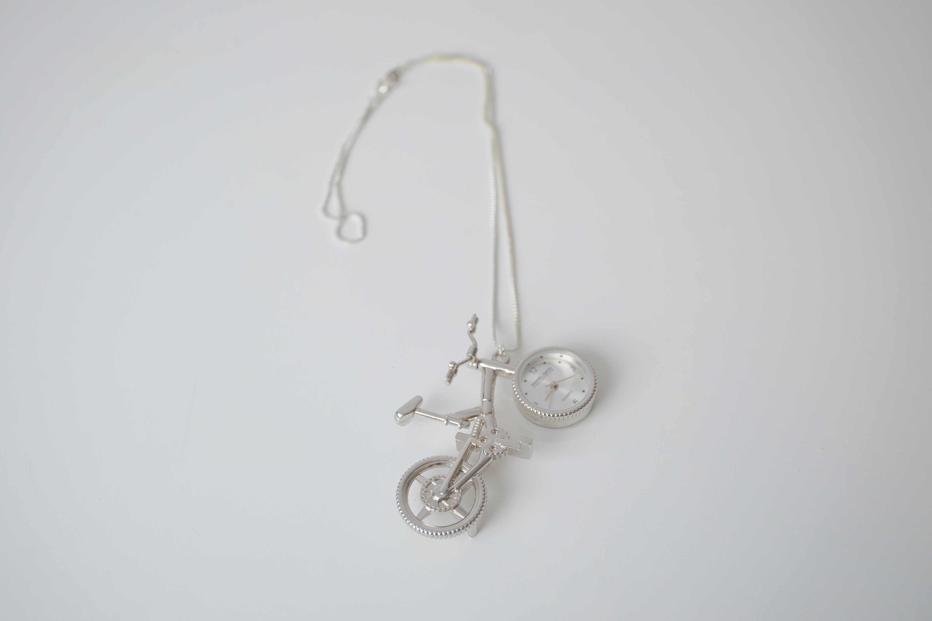 Silver-tone bicycle watch pendant necklace
