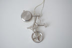 Silver-tone bicycle watch pendant necklace