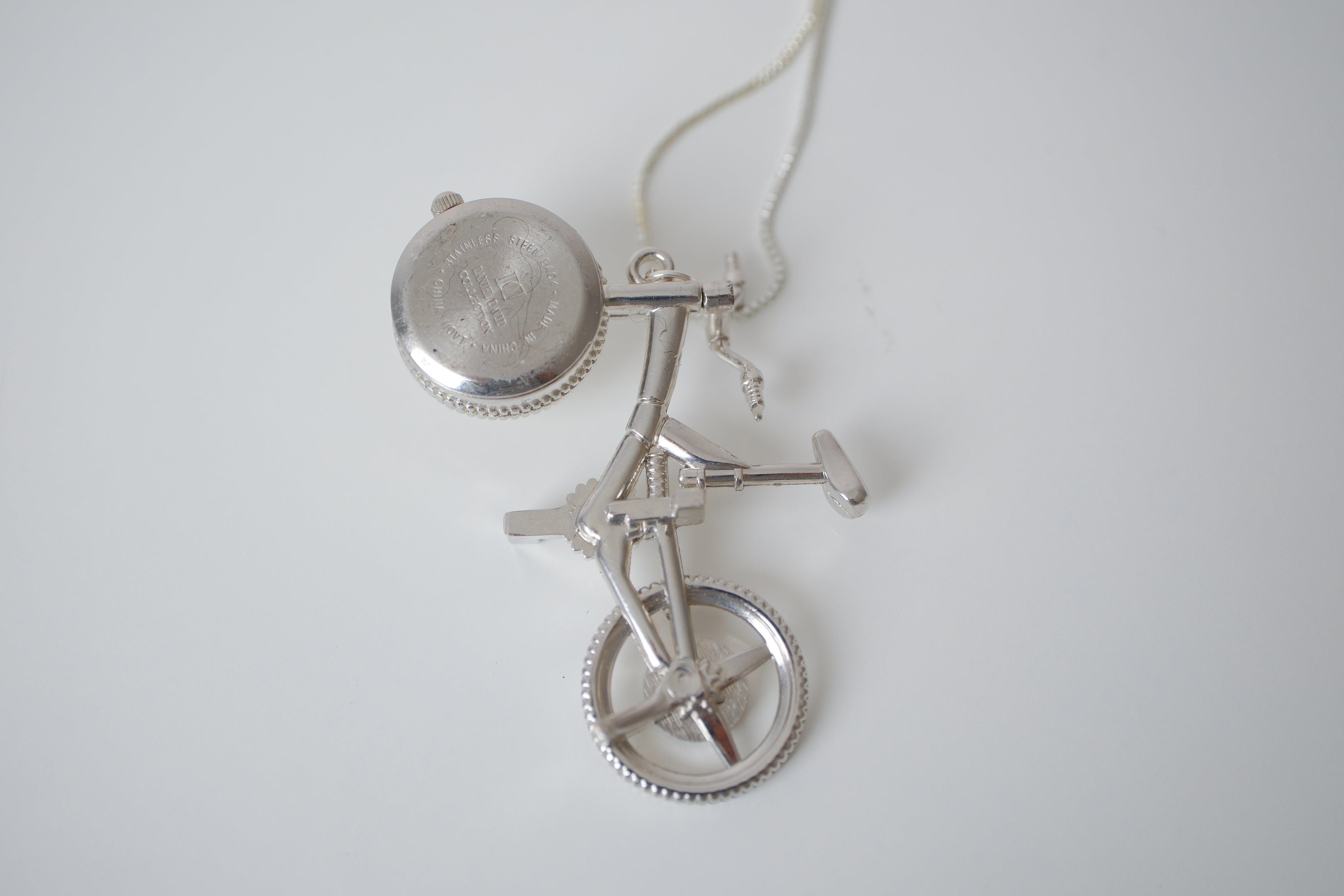 Silver-tone bicycle watch pendant necklace