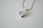 Small shiny heart locket necklace