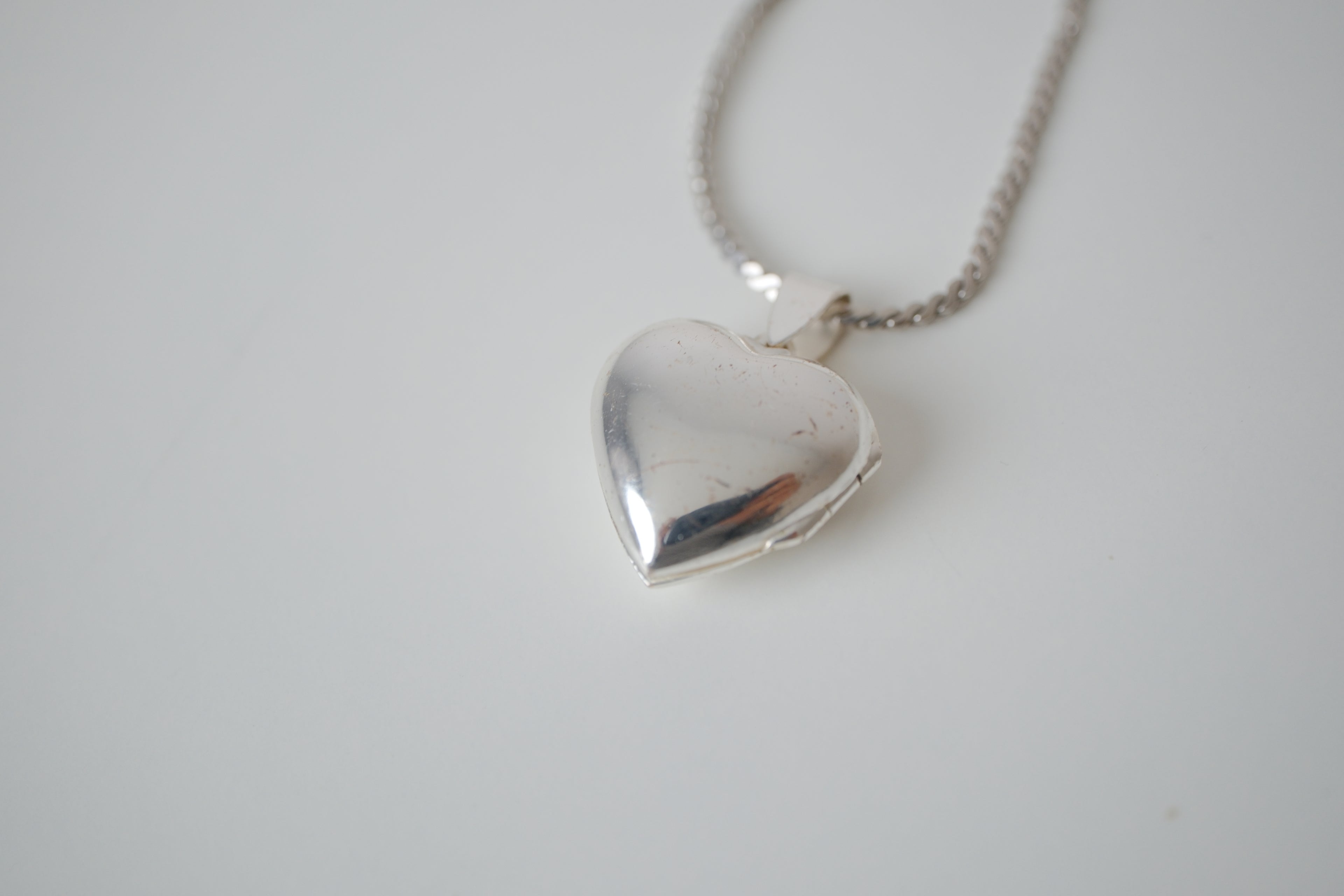 Small shiny heart locket necklace