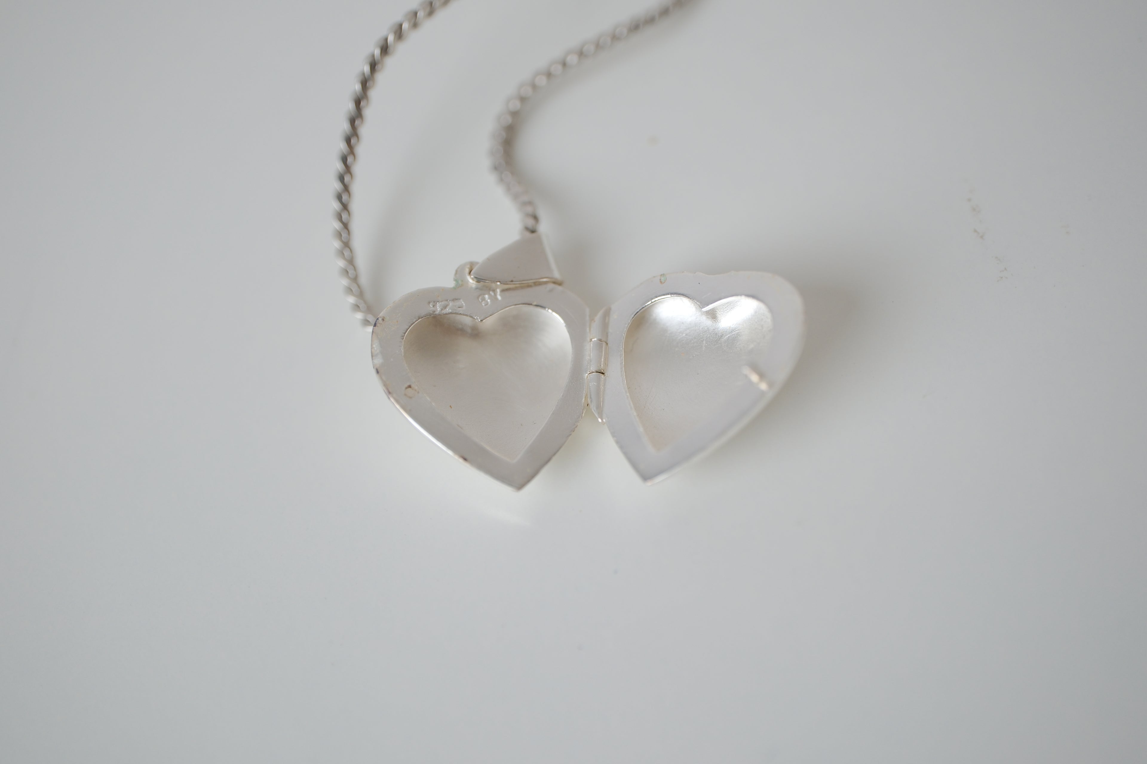 Small shiny heart locket necklace