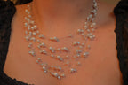 Multi-strand floating pearl illusion necklace