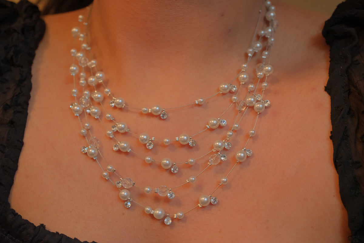 Multi-strand floating pearl illusion necklace