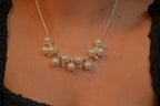 Vintage Avon faux pearl and rhinestone cluster necklace