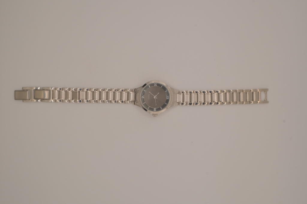 Vintage Avon women's silver-tone dress watch