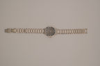 Vintage Avon women's silver-tone dress watch