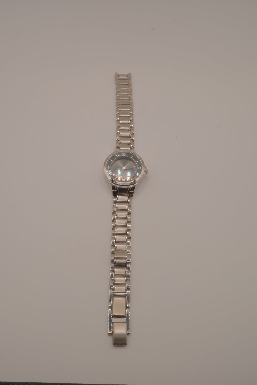 Vintage Avon women's silver-tone dress watch