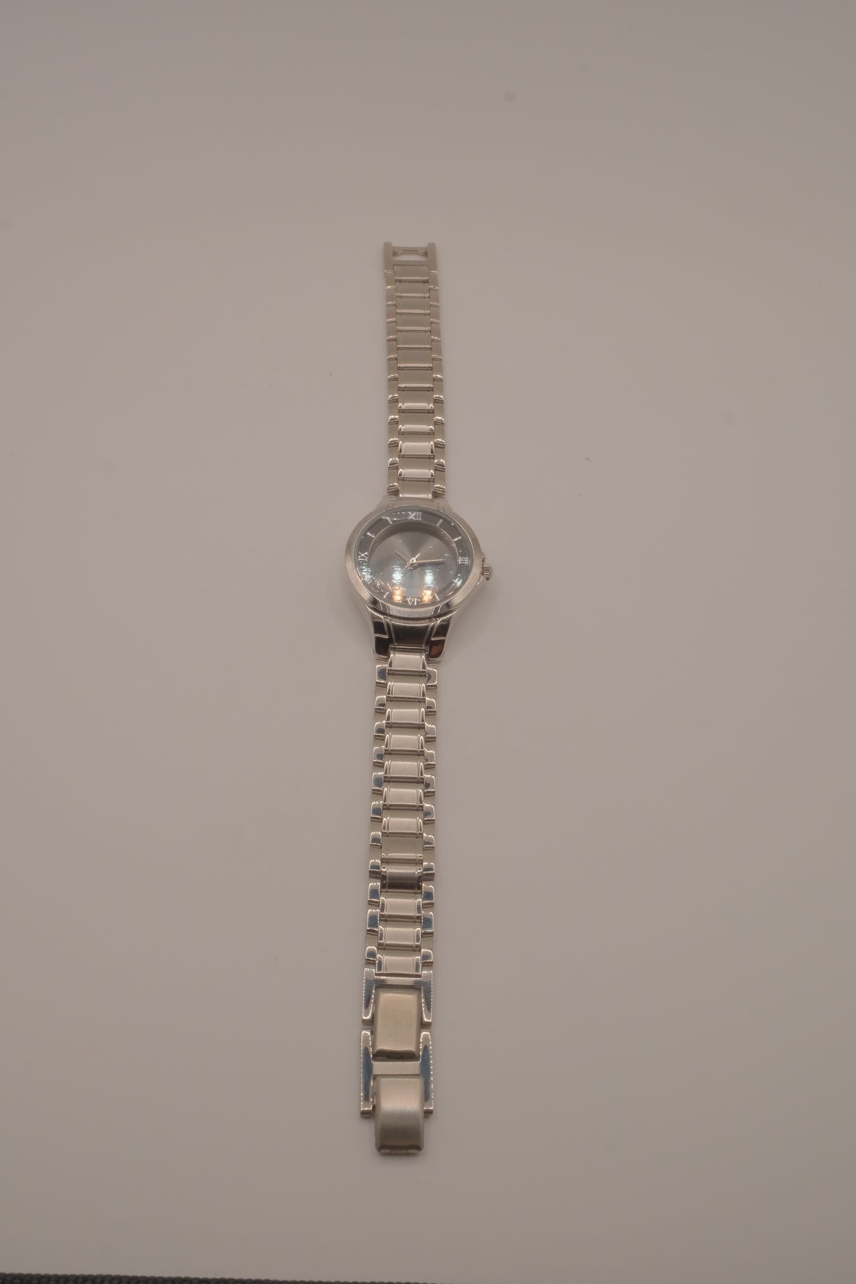 Vintage Avon women's silver-tone dress watch