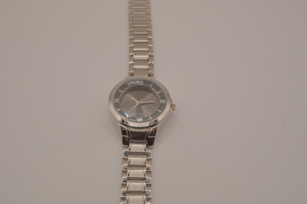 Vintage Avon women's silver-tone dress watch