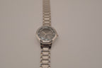 Vintage Avon women's silver-tone dress watch