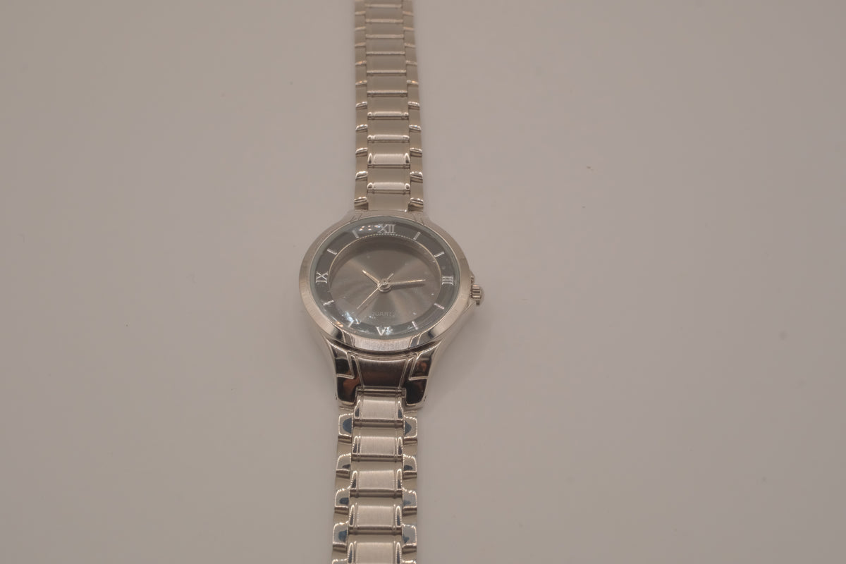 Vintage Avon women's silver-tone dress watch