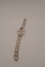 Vintage Avon women's silver-tone dress watch