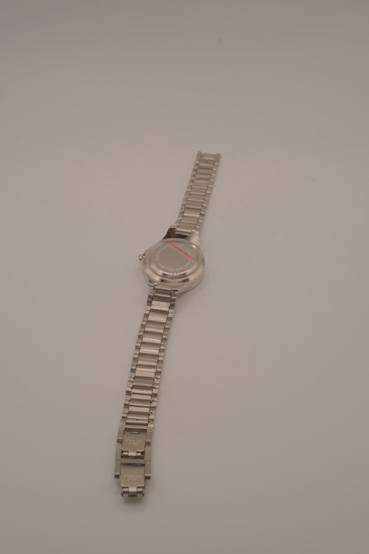 Vintage Avon women's silver-tone dress watch
