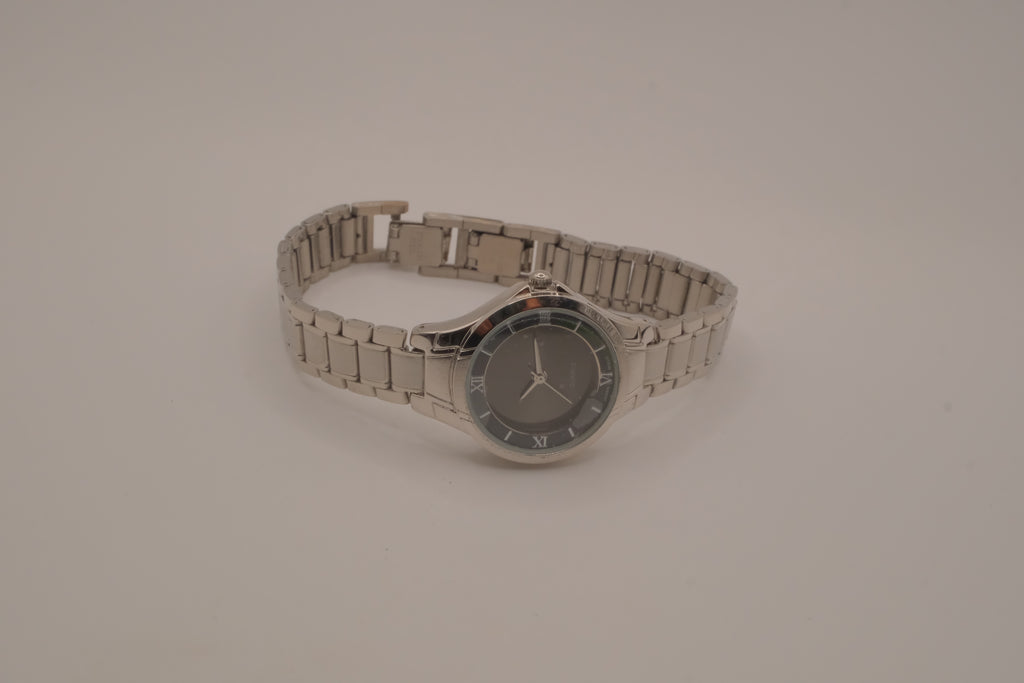Vintage Avon women's silver-tone dress watch