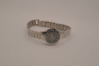 Vintage Avon women's silver-tone dress watch