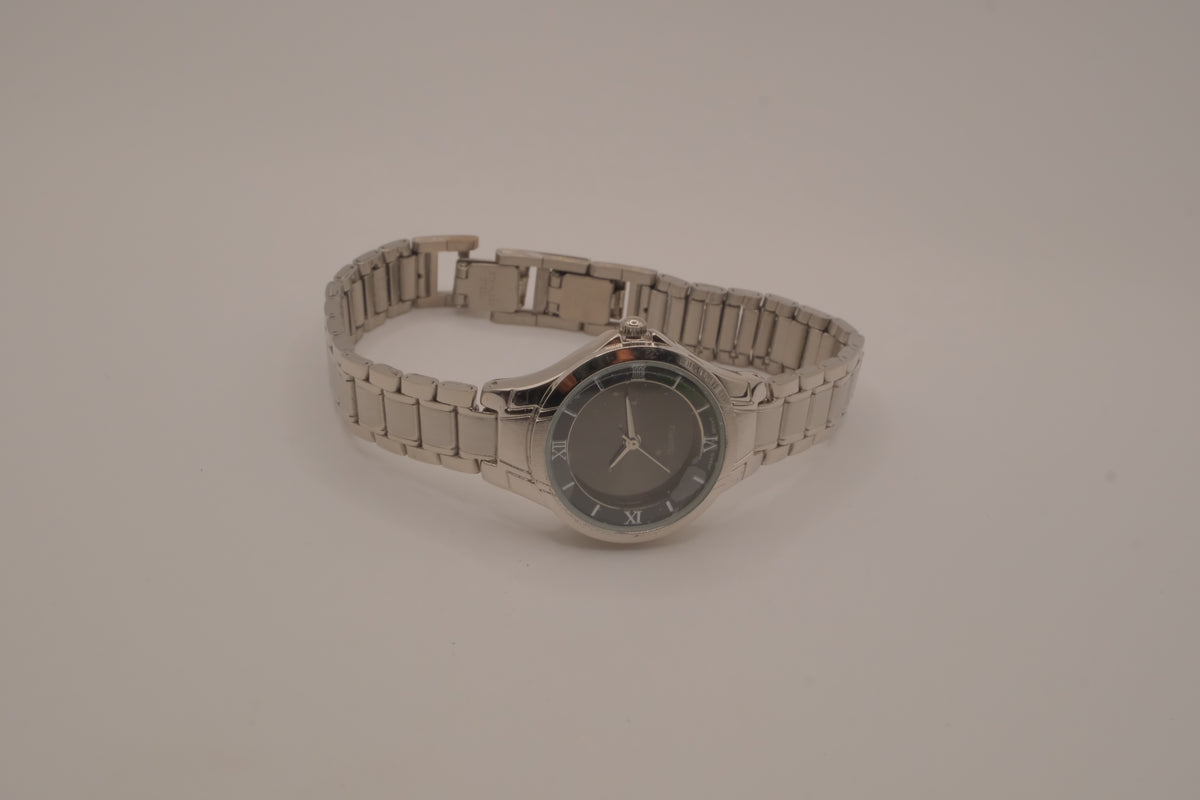 Vintage Avon women's silver-tone dress watch