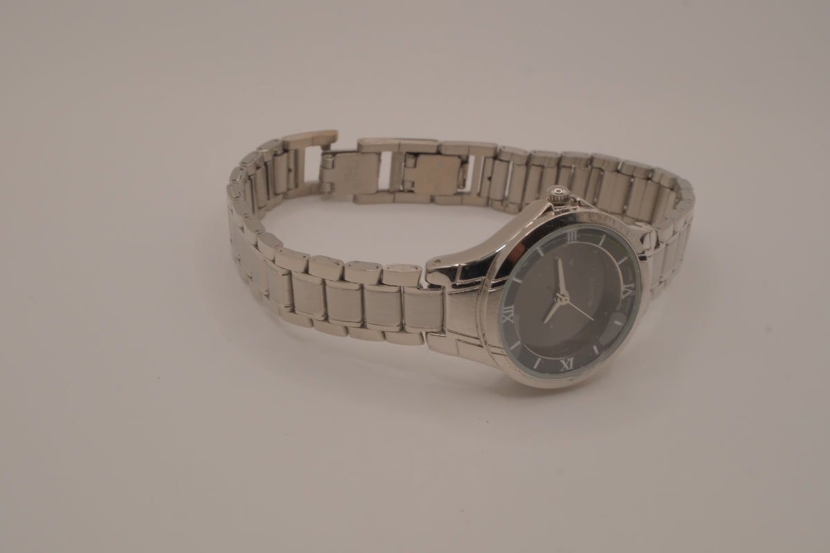 Vintage Avon women's silver-tone dress watch