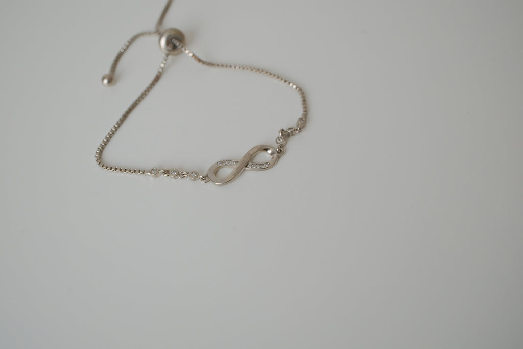 Sterling silver infinity symbol bolo bracelet