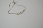 Sterling silver infinity symbol bolo bracelet