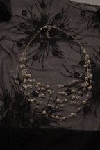 Multi-strand floating pearl illusion necklace